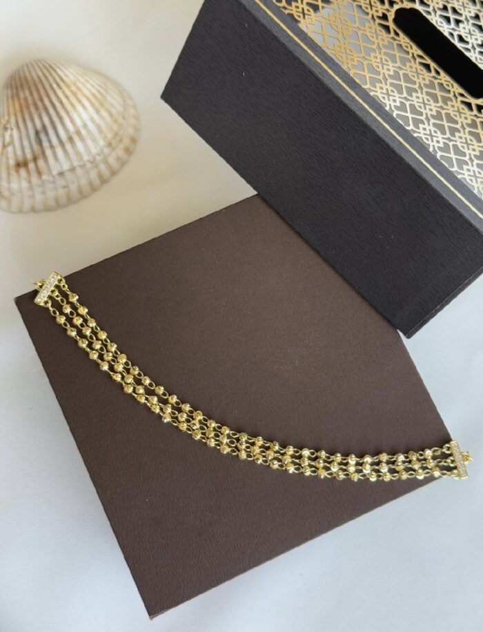 Gold renk dorika top top bileklik