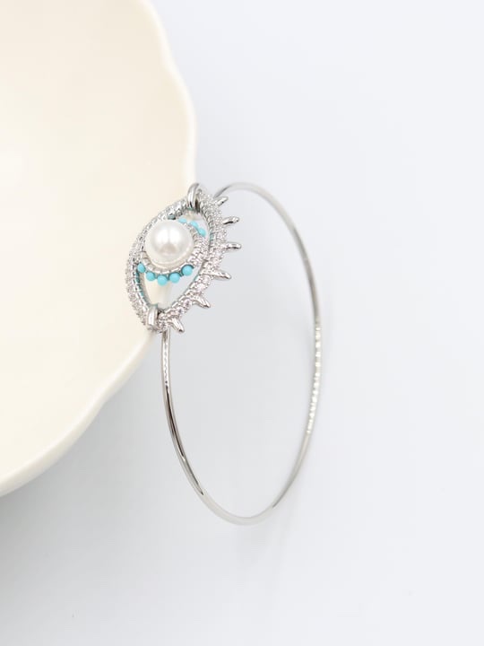 Silver renk inci detaylı göz kelepçe bileklik