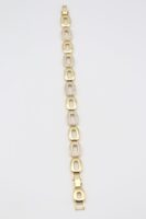 Gold bombeli halka halka taş detaylı bileklik