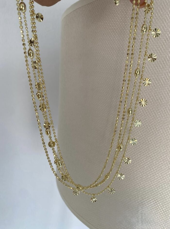 Gold renk zincirlerden oluşan çoklu kolye