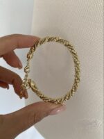 Gold renk sarmal dorika kelepçe bileklik