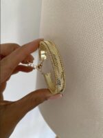 Gold renk balık sırtı dorika detaylı kelepçe bileklik