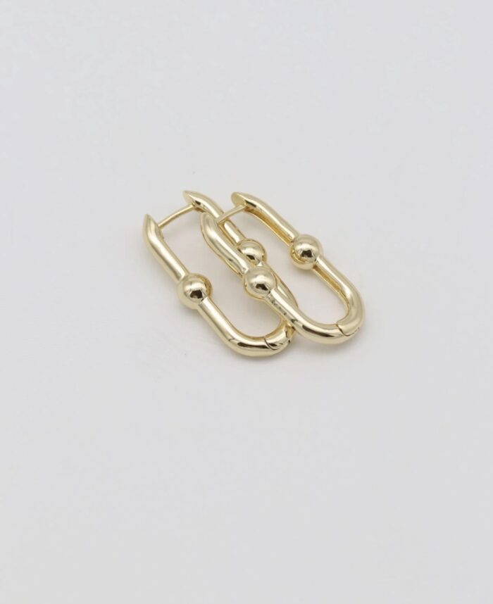 Gold renk top detaylı u küpe (27mm)