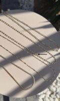 Gold renk lazer kesim top top kolye